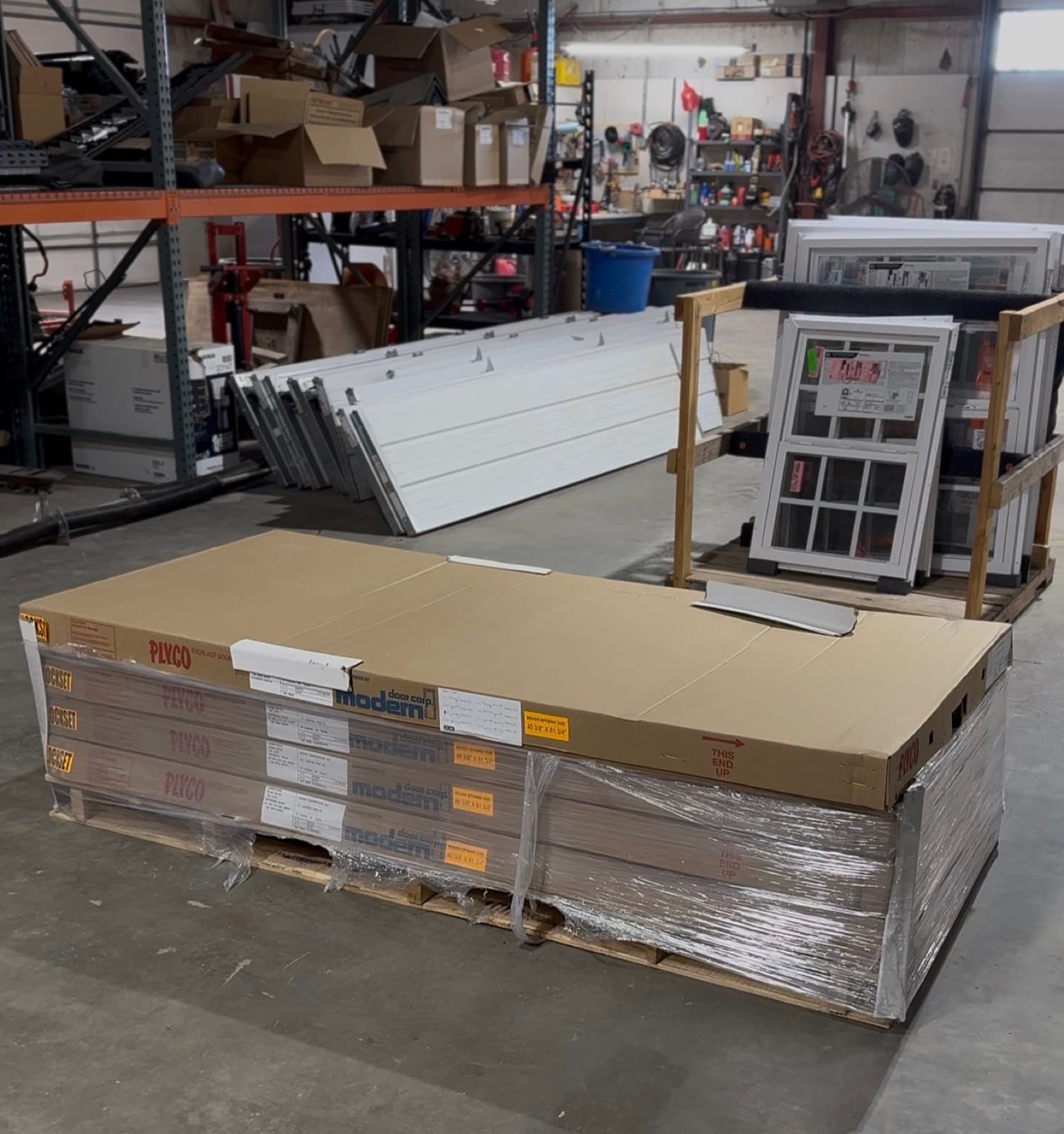 Plyco pre-hung doors and single-hung windows ready for post frame builds at HRI Supply